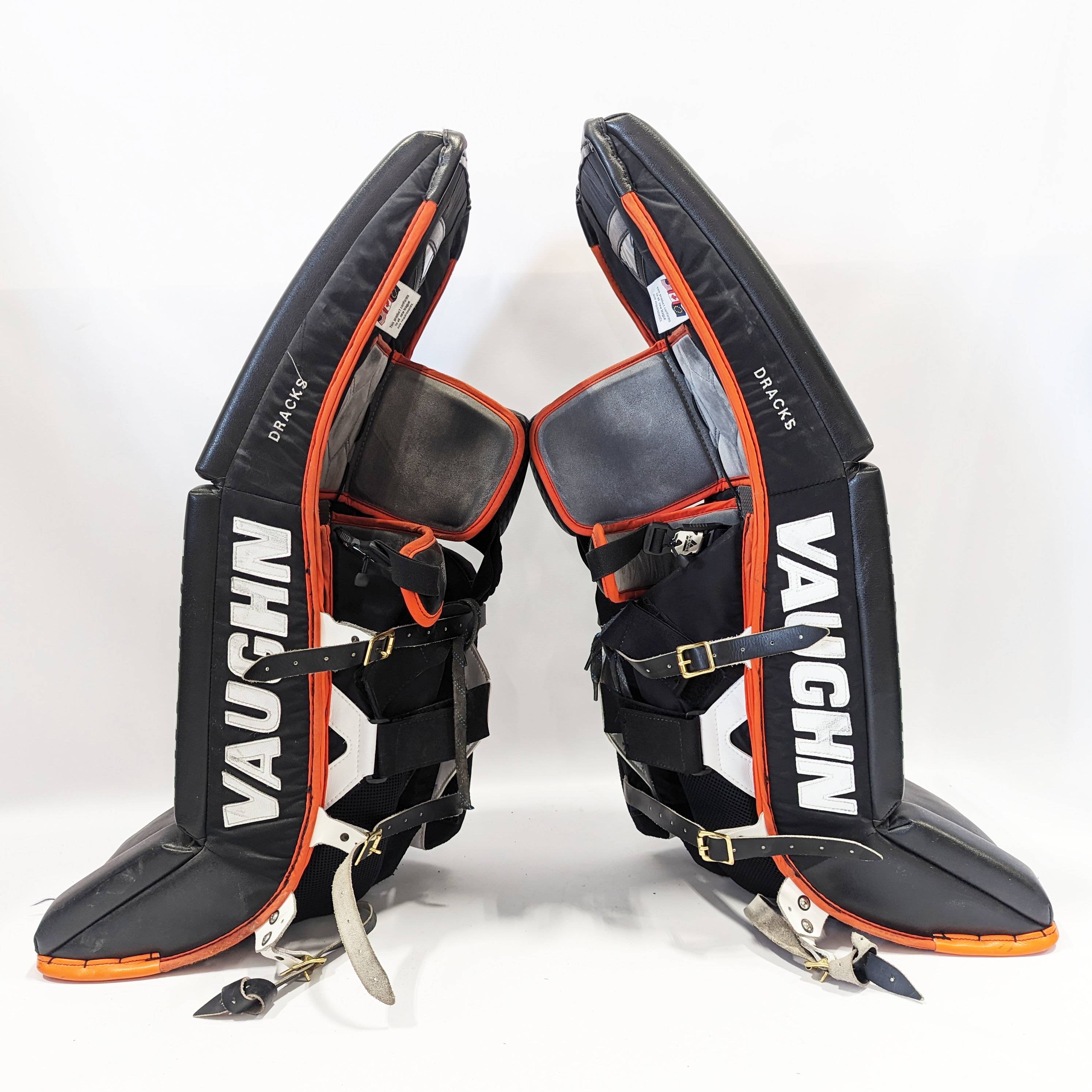 Vaughn Ventus SLR - Jambières de gardien NCCA Pro Stock d'occasion (noir/orange/blanc)